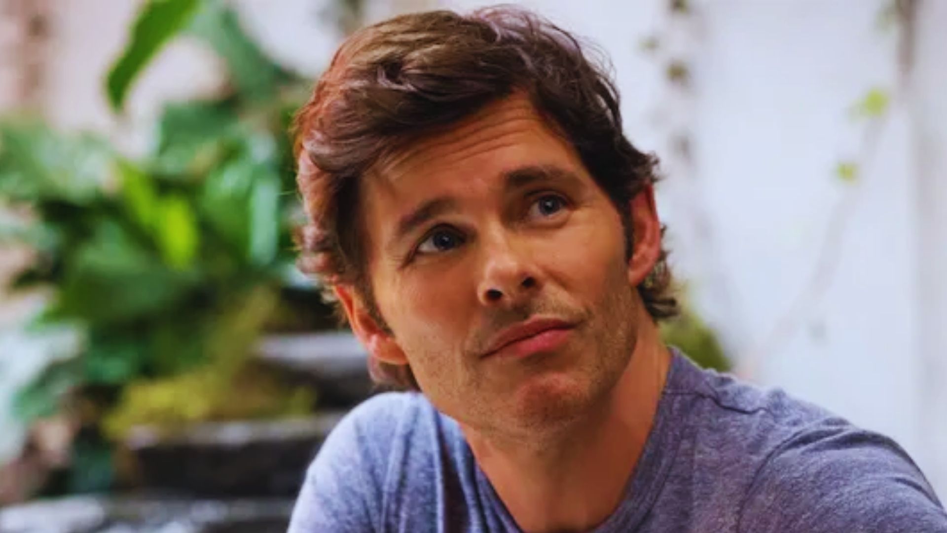 James Marsden as Stu Redman, featuring brown hair and a blue shirt in a scene from the 2020 movie "The Stand."