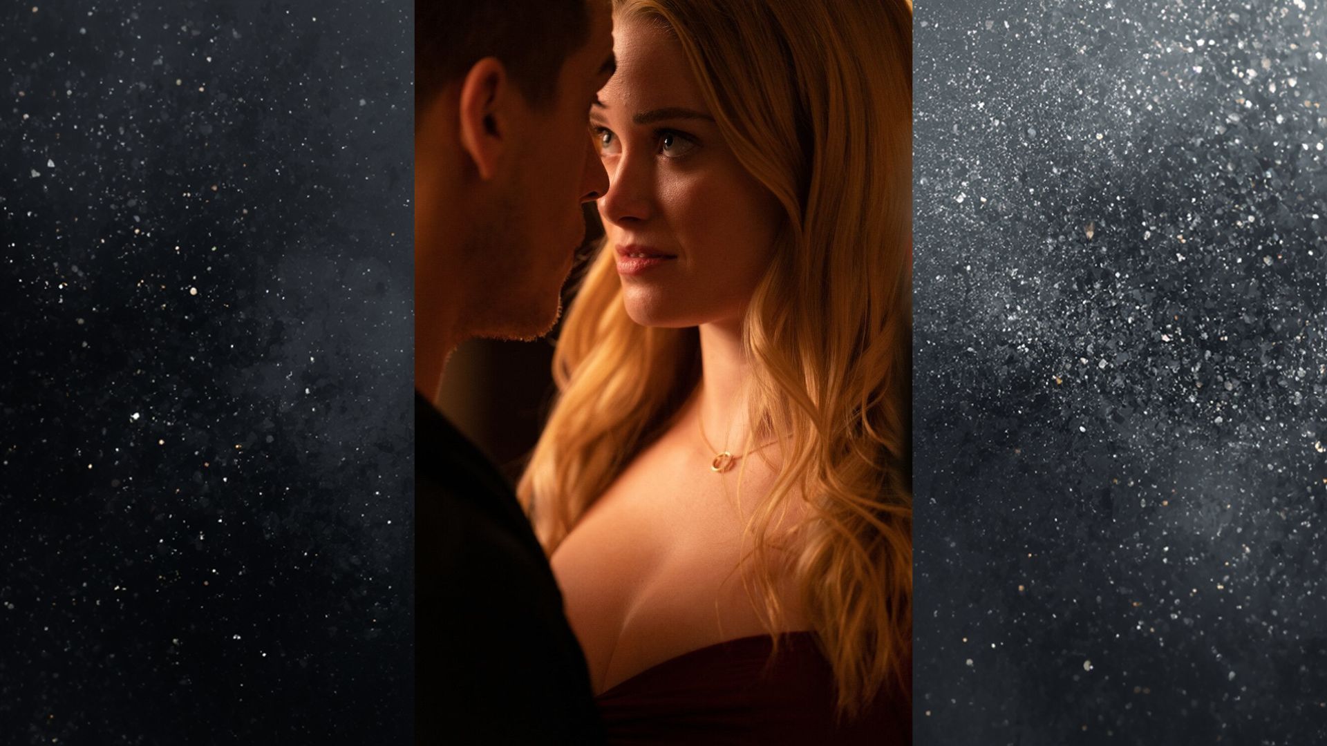  A couple gazes into each other's eyes, illuminated by soft light in a dark setting, conveying intimacy and connection.