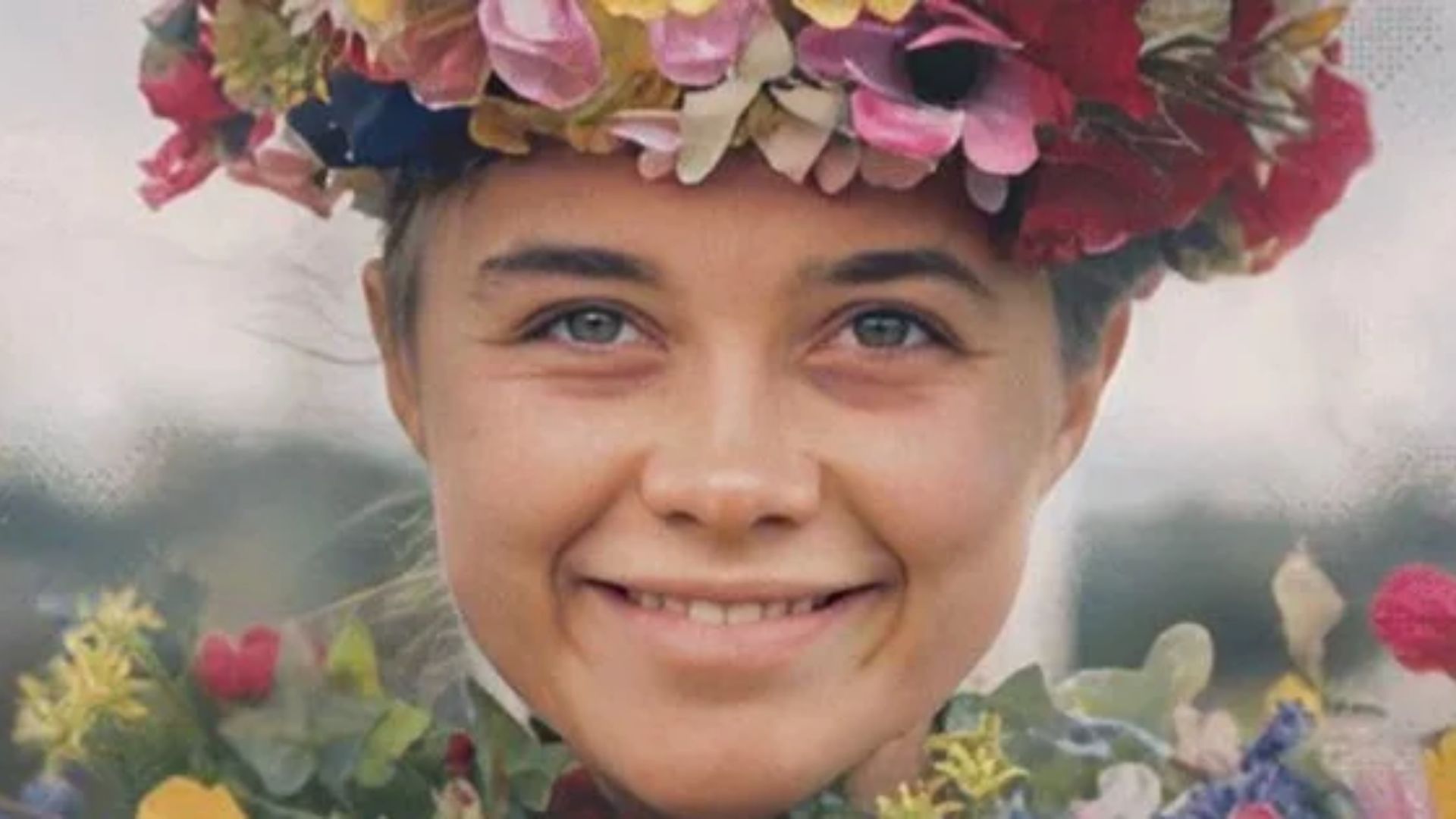 A smiling woman with a floral crown, radiating joy and beauty.
