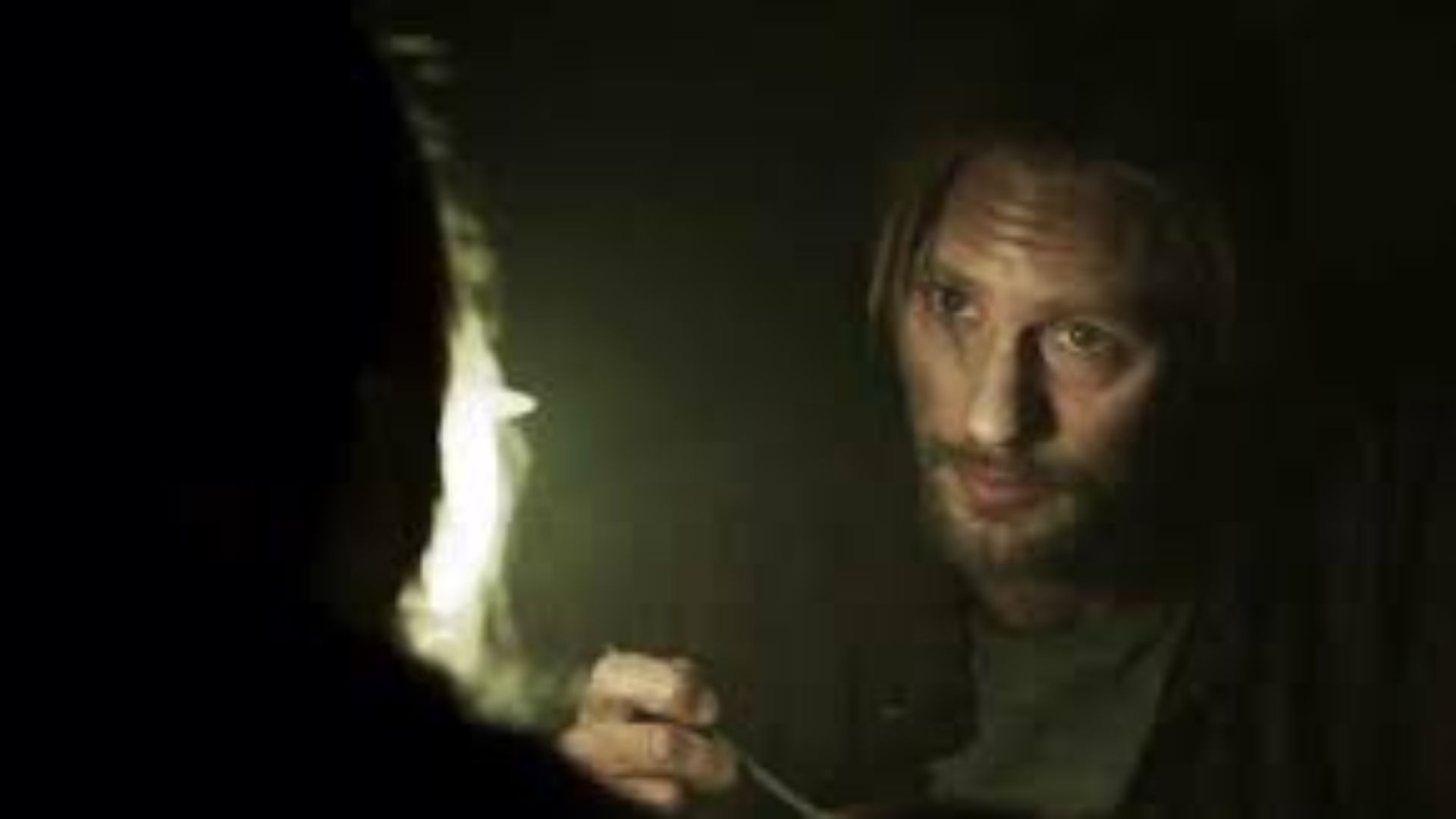 The Walking Dead Season 7, Episode 9 promotional image featuring ominous themes and characters hinting at impending danger.