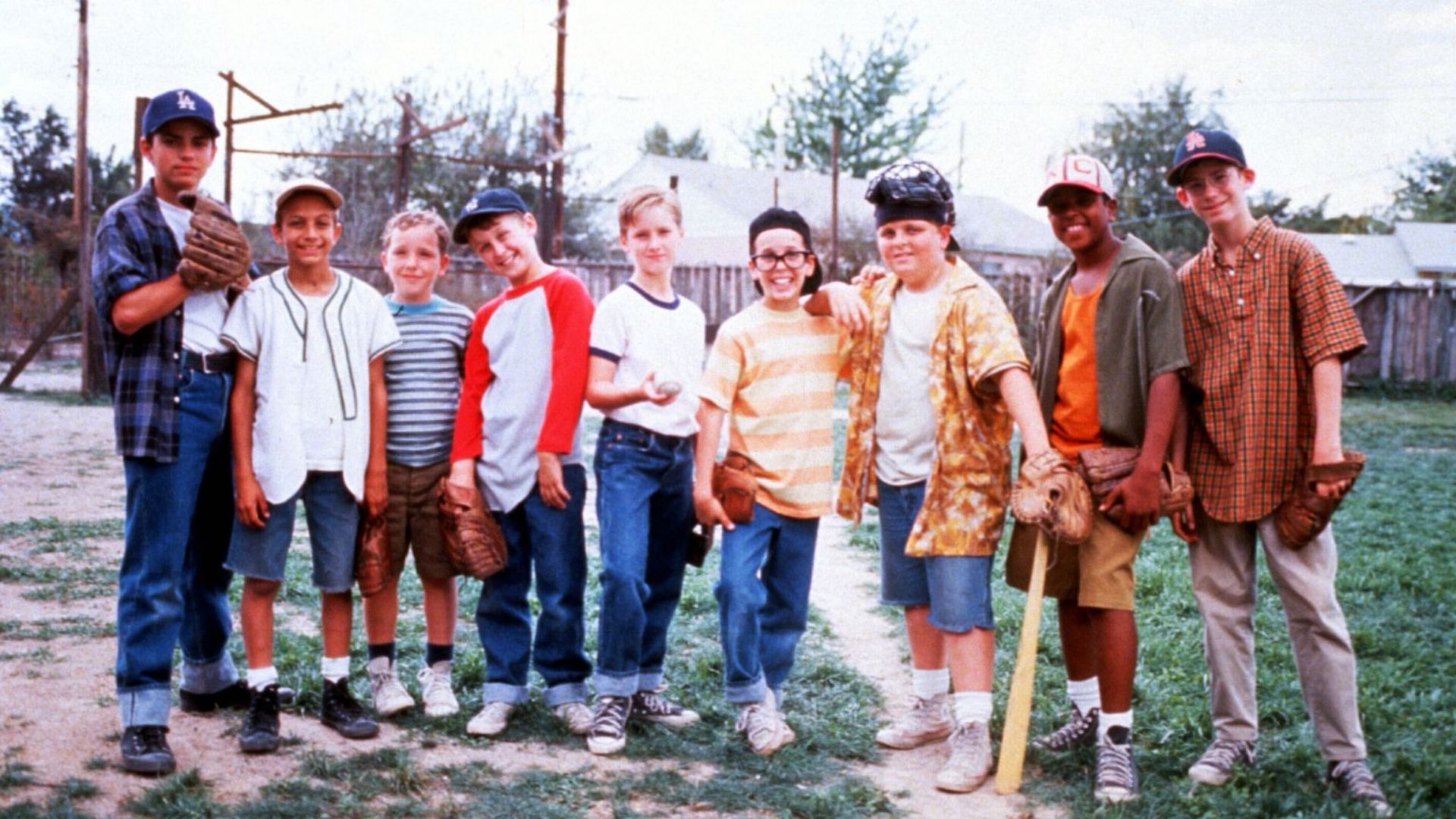 A group of young boys poses for a photo at the Sandlot filming location, Scotty Smalls and Benny's neighborhood.
