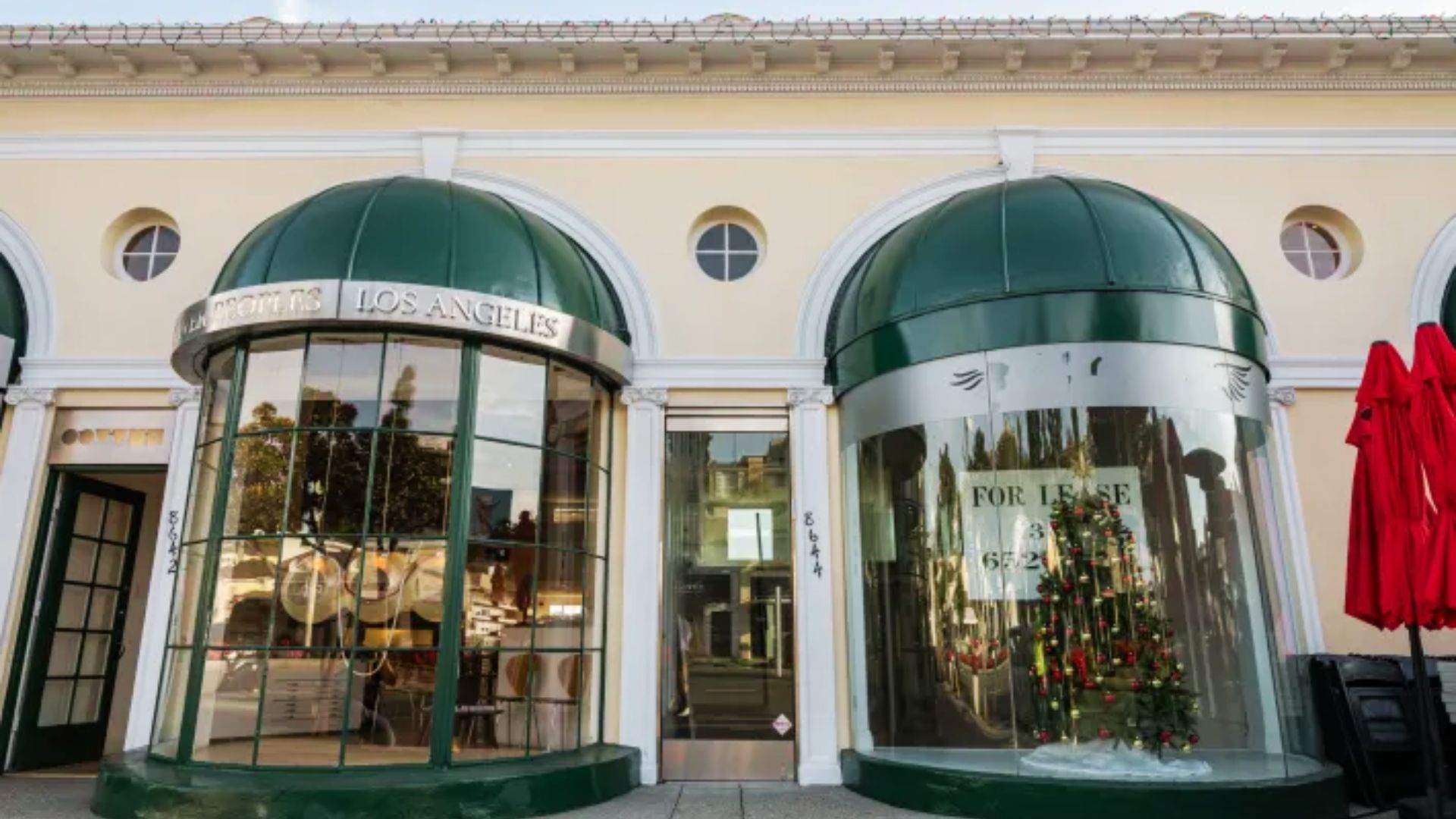 Los Angeles storefront with distinctive green and white windows, recognized as a filming site for the movie "Scarface."