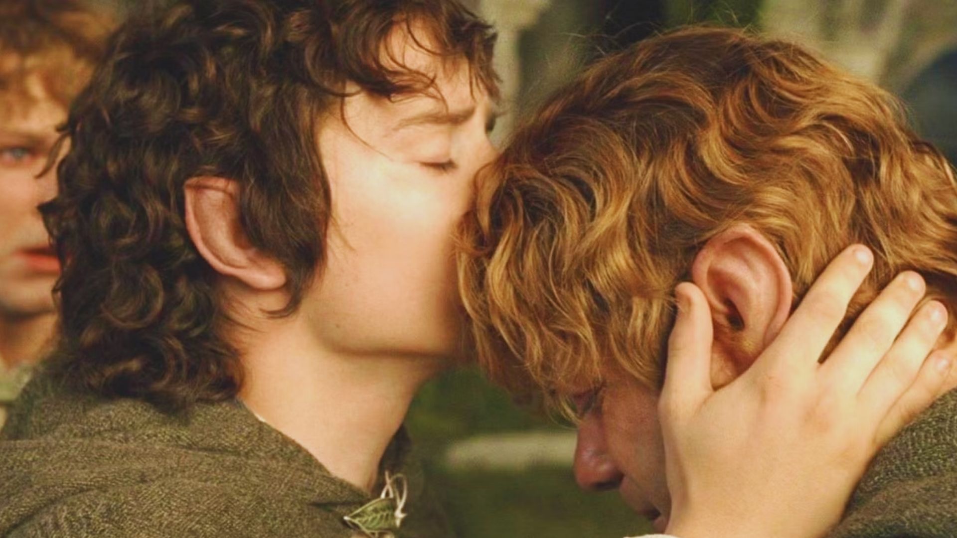 Two characters with curly hair, one with curly dark hair, gently embrace. The character on the left kisses the other's forehead, conveying warmth and friendship.