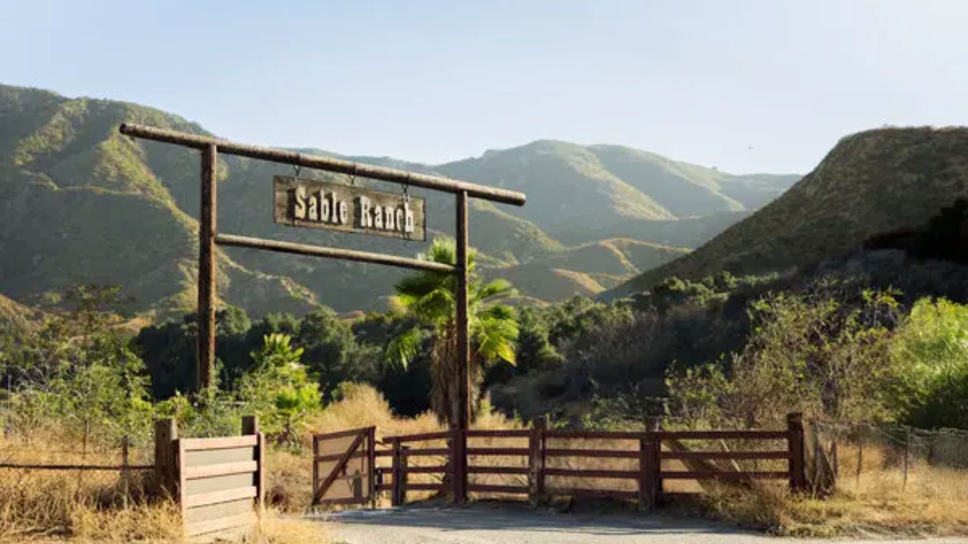 Wooden “Sable Ranch” gate with rolling hills behind, a filming site used in The Rifleman.