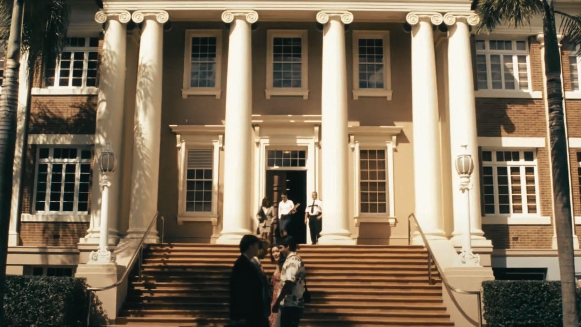 Grand neoclassical courthouse with tall columns and steps, filmed at Brisbane City Hall in Queensland.