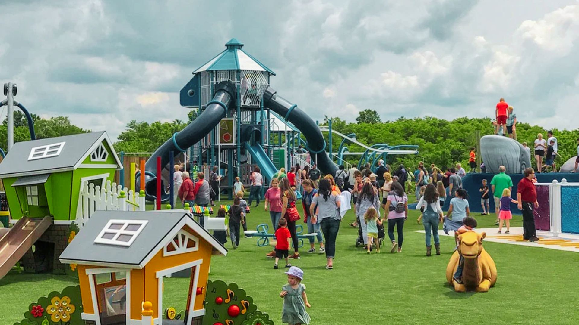 Families and children play at the colorful Ark Encounter playground near Noah’s Ark.
