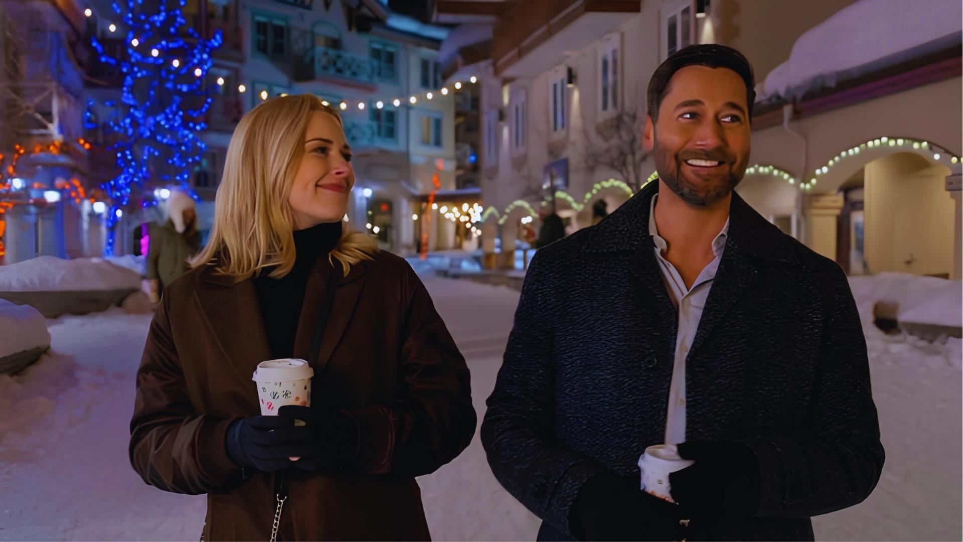 Lacey Chabert and Ryan Eggold as leads in My Secret Santa walking through a snowy resort village with holiday lights.