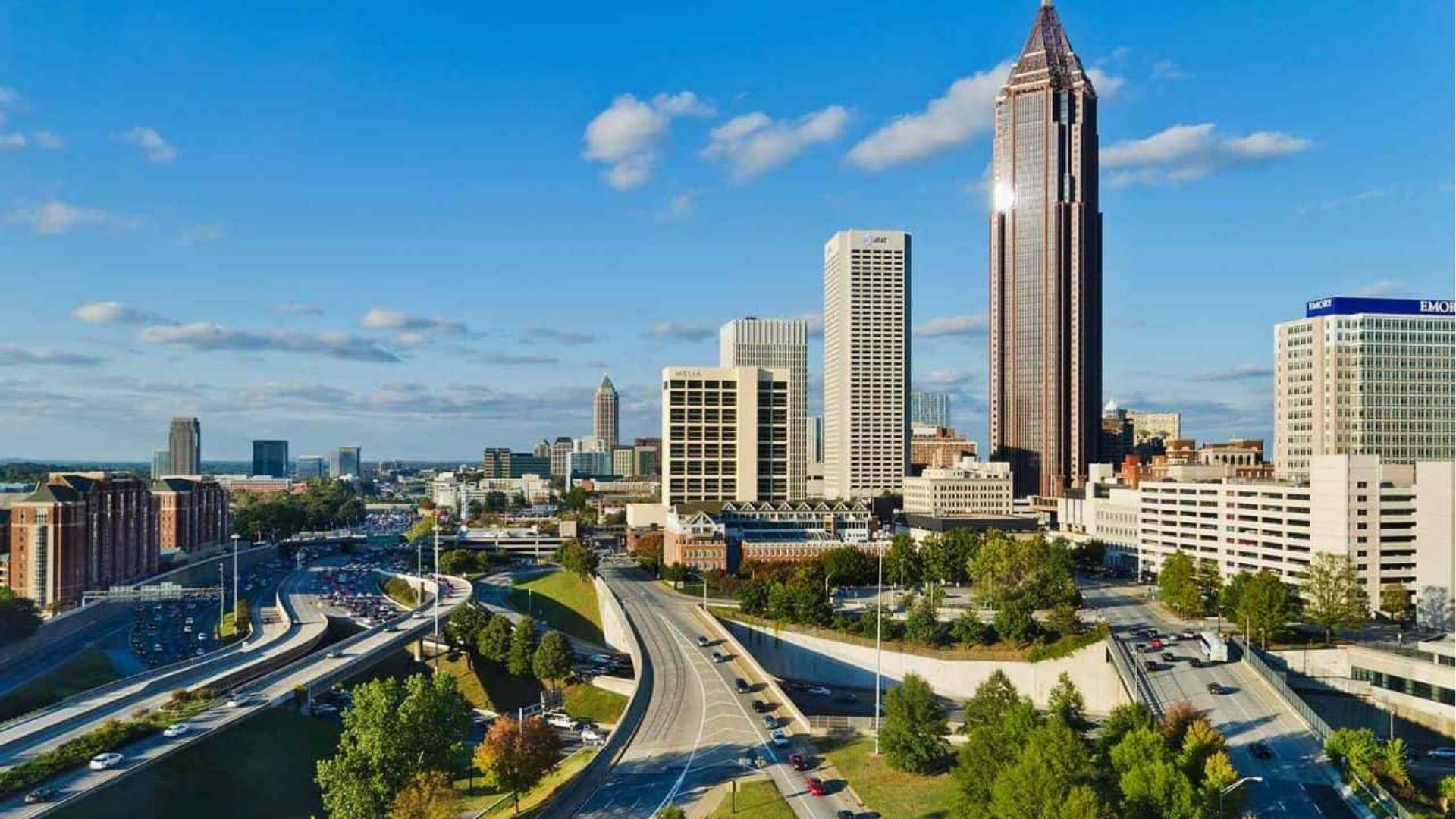 Daytime view of Atlanta skyline and highways, main production city for Caught in the Act Unfaithful