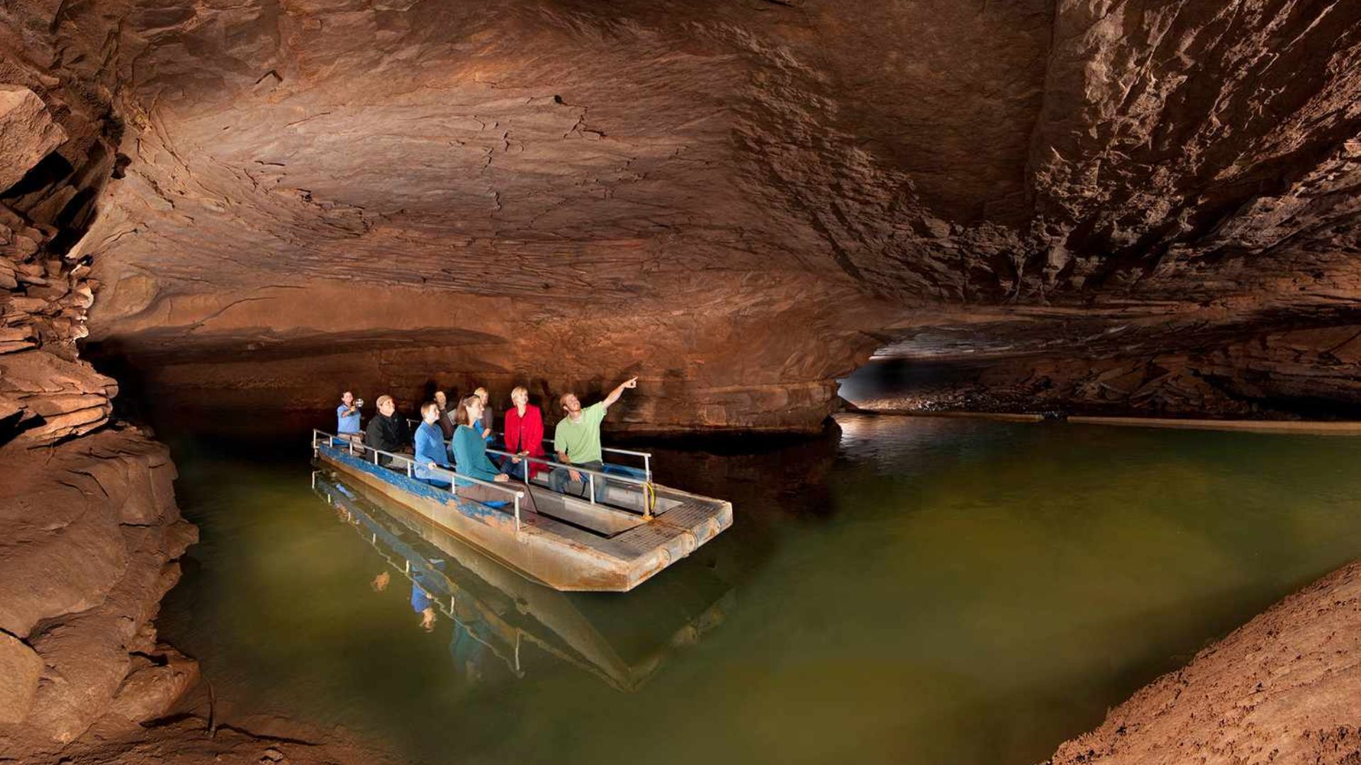 GROUP OF PEOPLE VISTING UNDERWATERS CAVES

