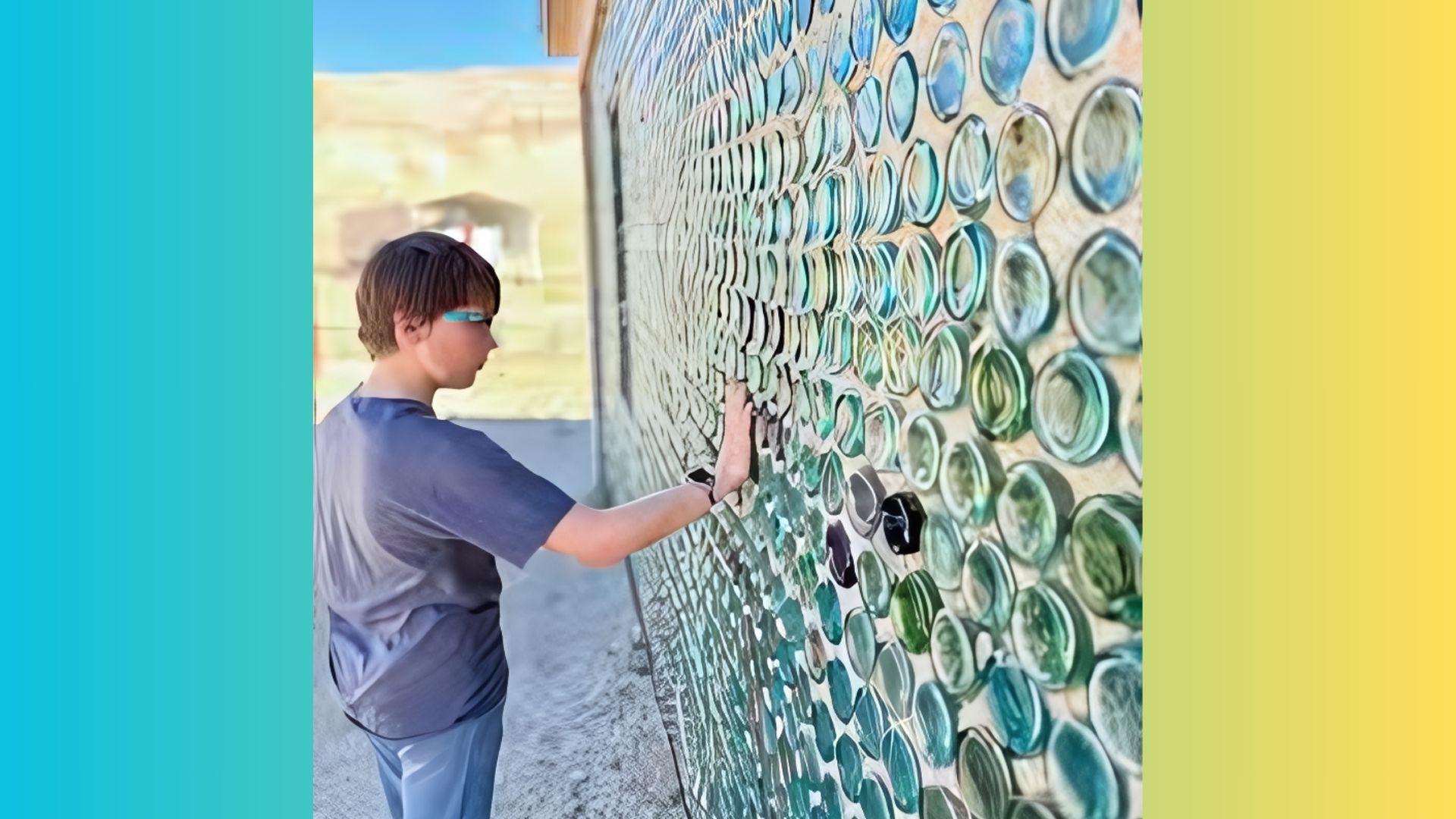 A BOY ADMIRING A HOUSE MADE ENTIRELY OF BOTTLES
