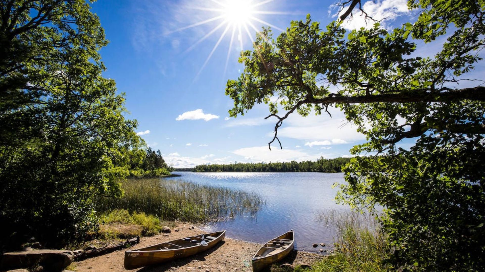 A PHOTO OF 2 BOATS NEAR BOUNDARY WATERS
