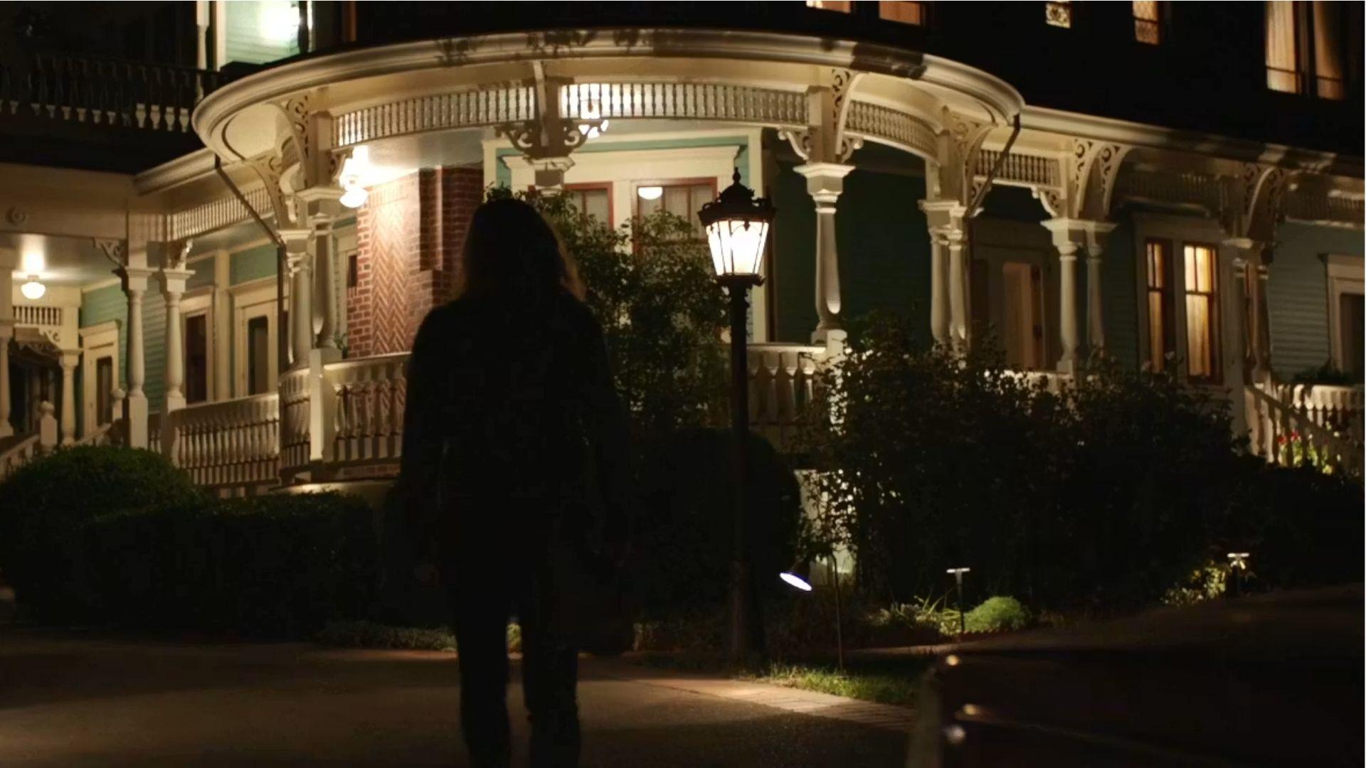 Camille Preaker returns to the Crellin House at night in Sharp Objects HBO series