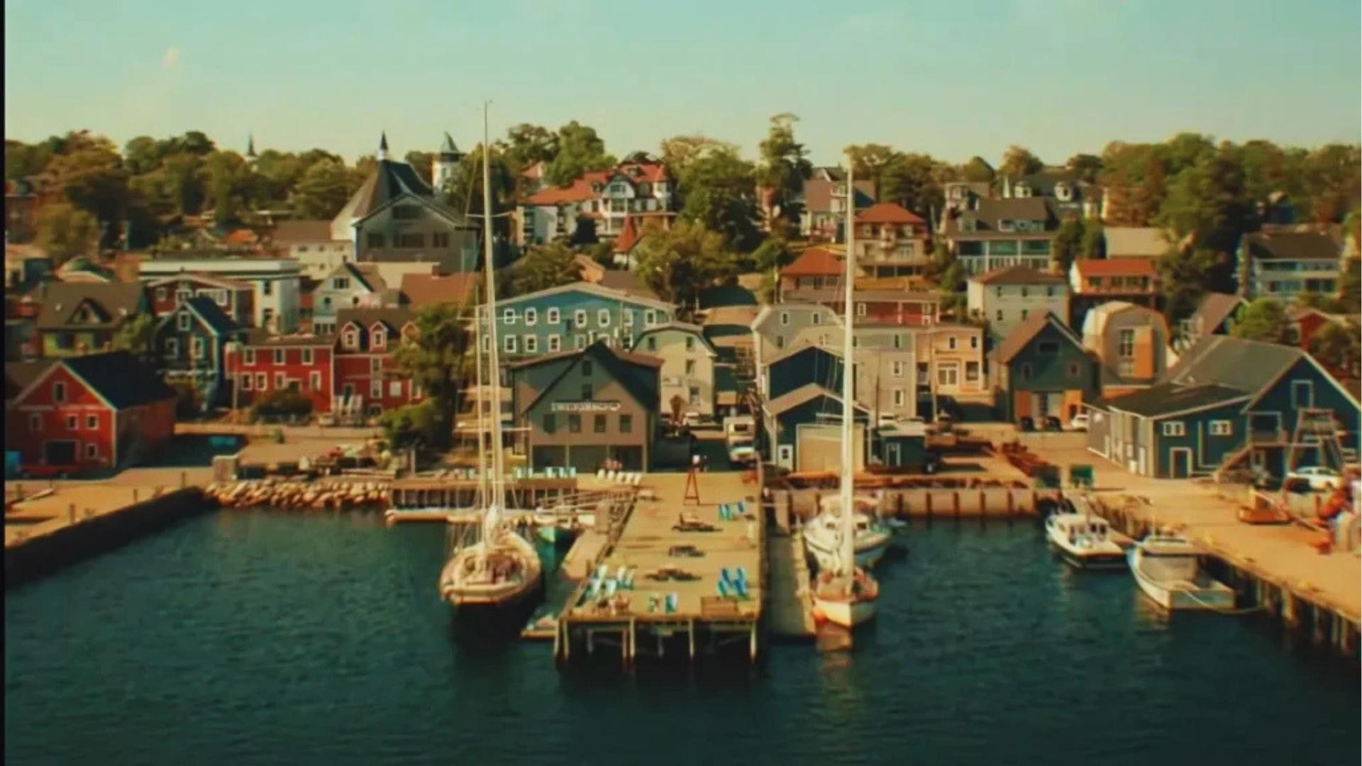 Lunenburg harbor with colorful houses and boats, main filming location for We Were Liars in Nova Scotia.