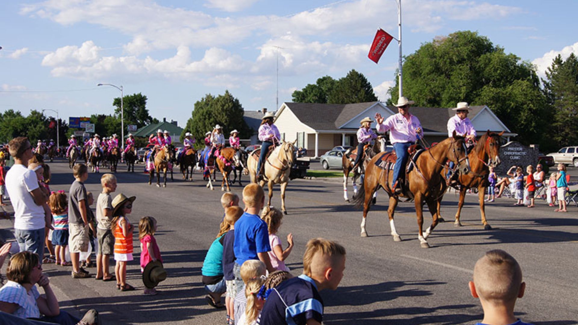 A lively street parade with participants on horseback, highlighting Preston's connection to the film "Napoleon Dynamite."