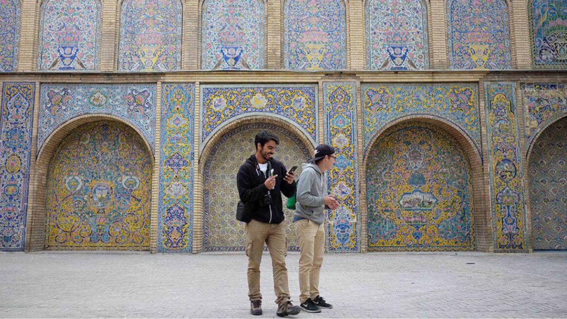 Visitors exploring locations associated with the filming of Tehran.
