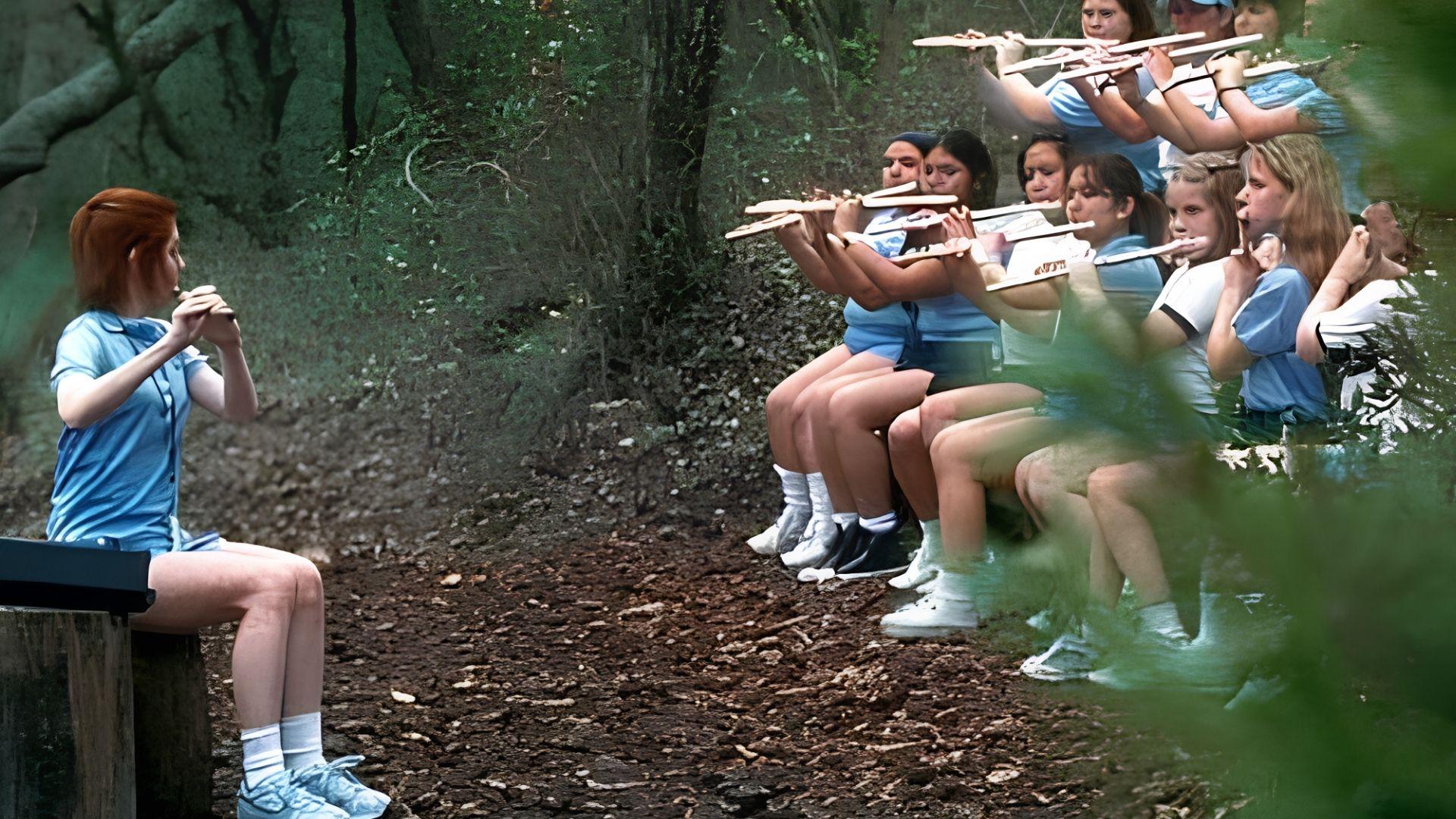 Still from American Pie 2 camp performance practice scene, group of girls harmonizing.