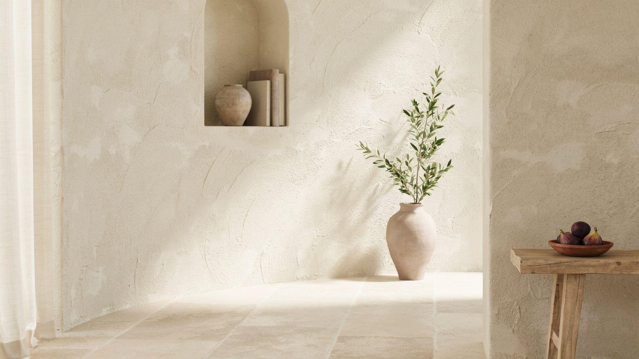Mediterranean room with textured plaster walls and soft natural light.