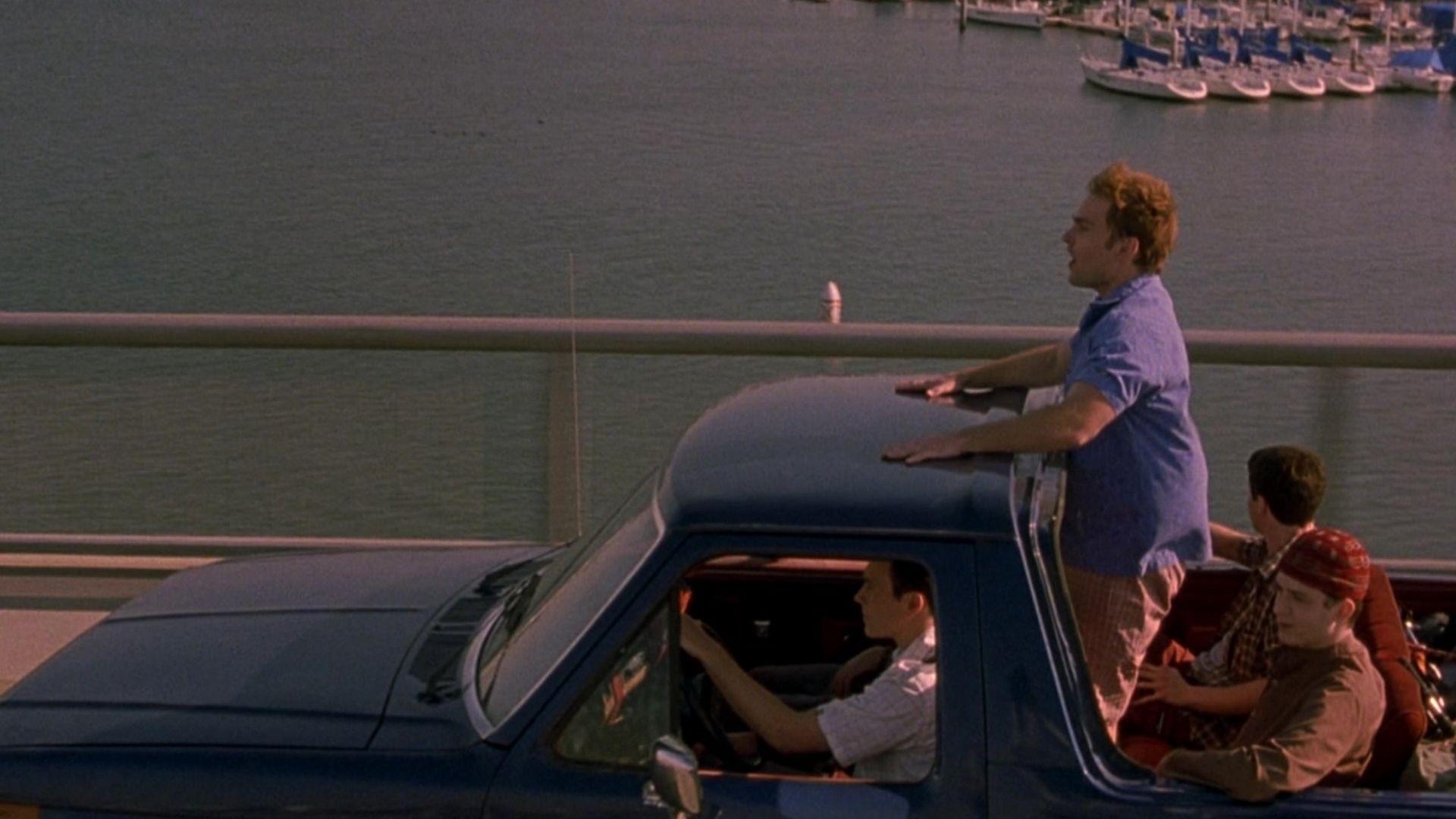Still from American Pie 2, main leads captured in a moving car, on the way to a road trip.