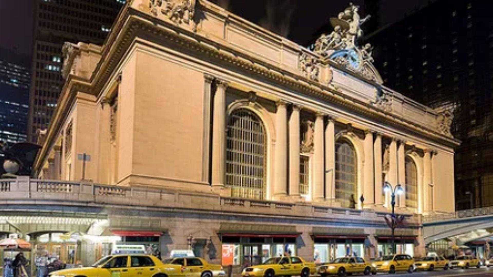 Grand Central Terminal New York City at night with yellow taxis a filming location used in Superman movies