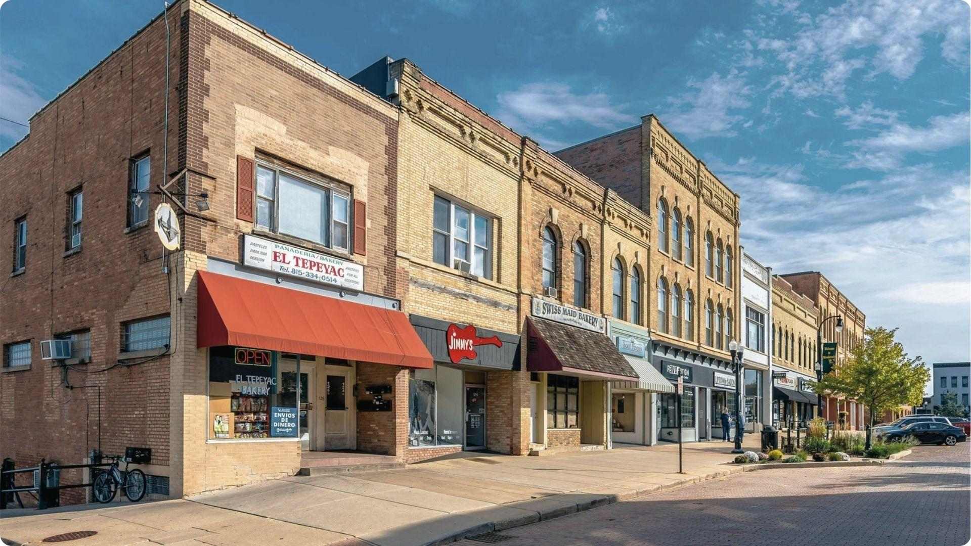 Historic Woodstock Square street with El Tepeyac Bakery, Jimmy’s, Swiss Maid. Groundhog Day town.
