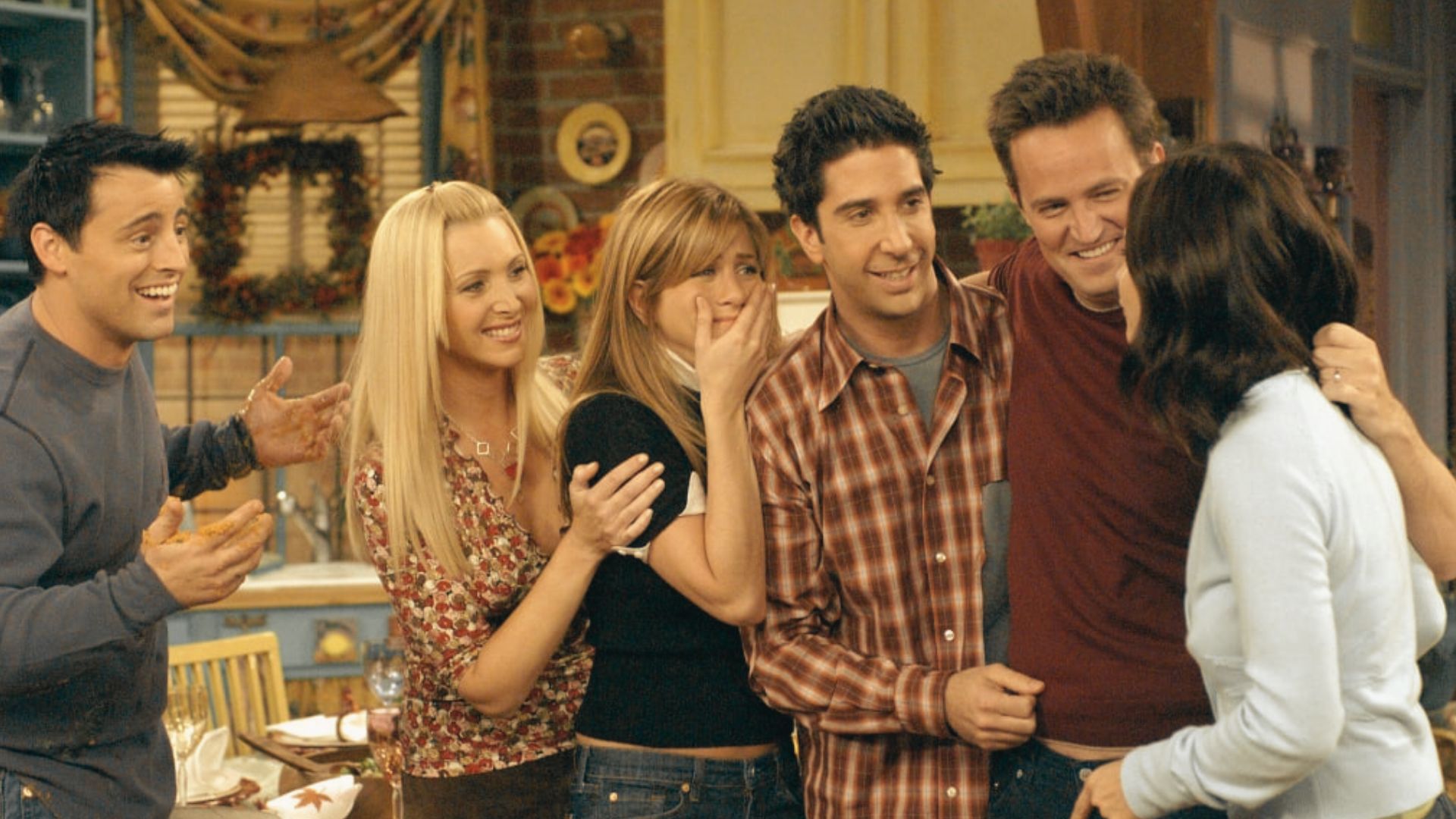 Friends cast members reunite on set for a special filming event, celebrating their iconic TV series.